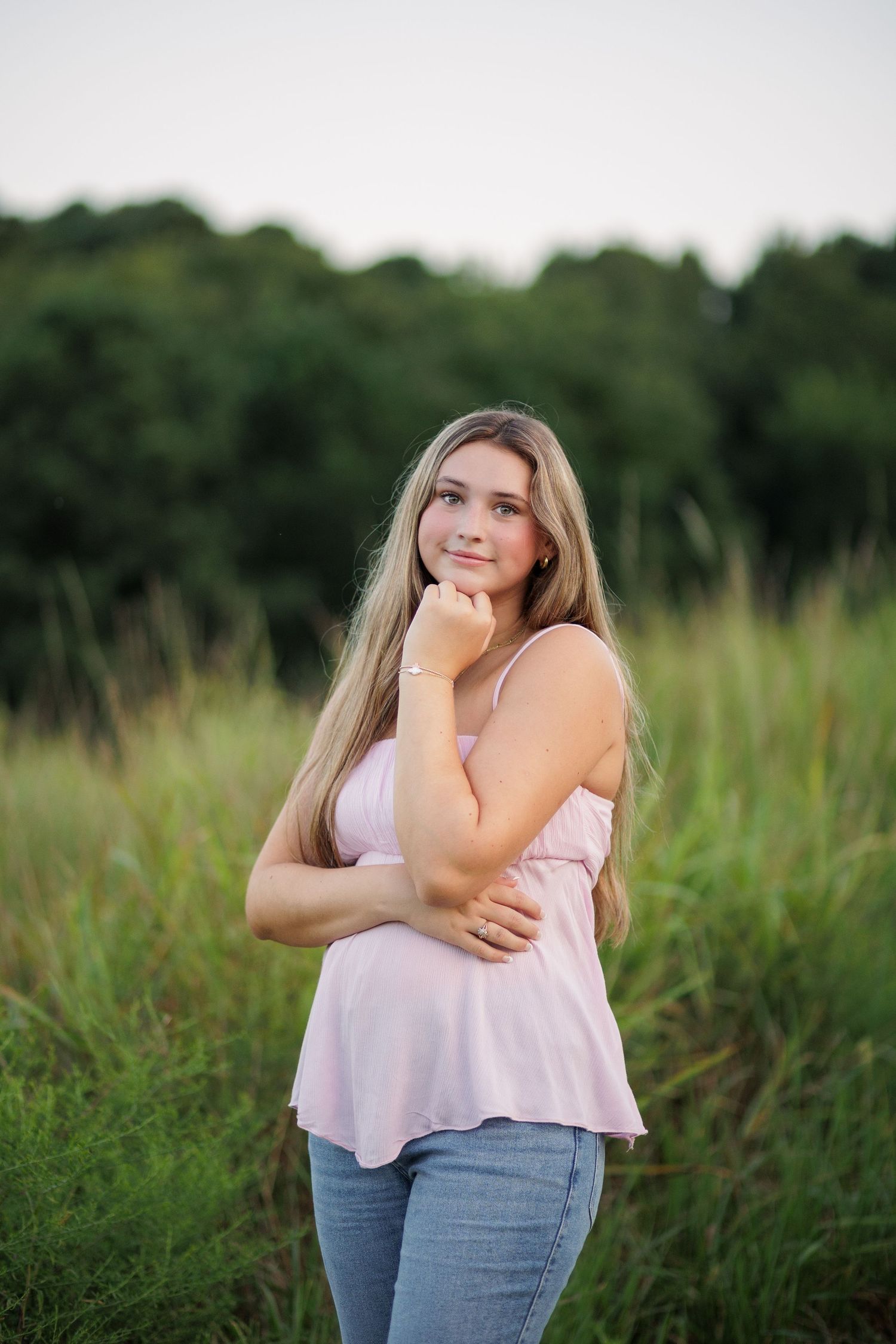 Senior Photography Session at NCMA in Raleigh NC, open field at sunset.