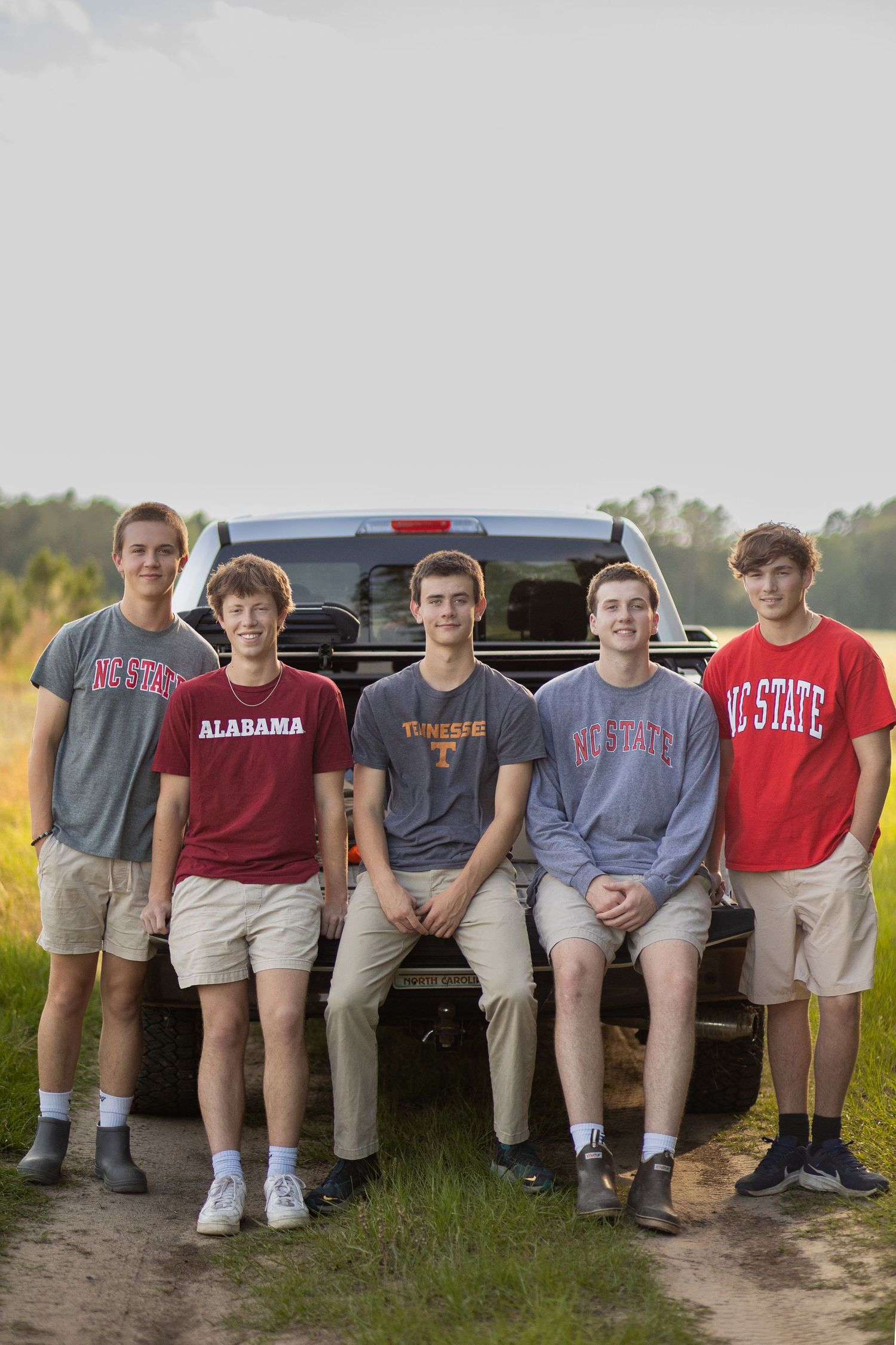 Senior Best Friends Portraits wearing college decision t-shirts in North Carolina