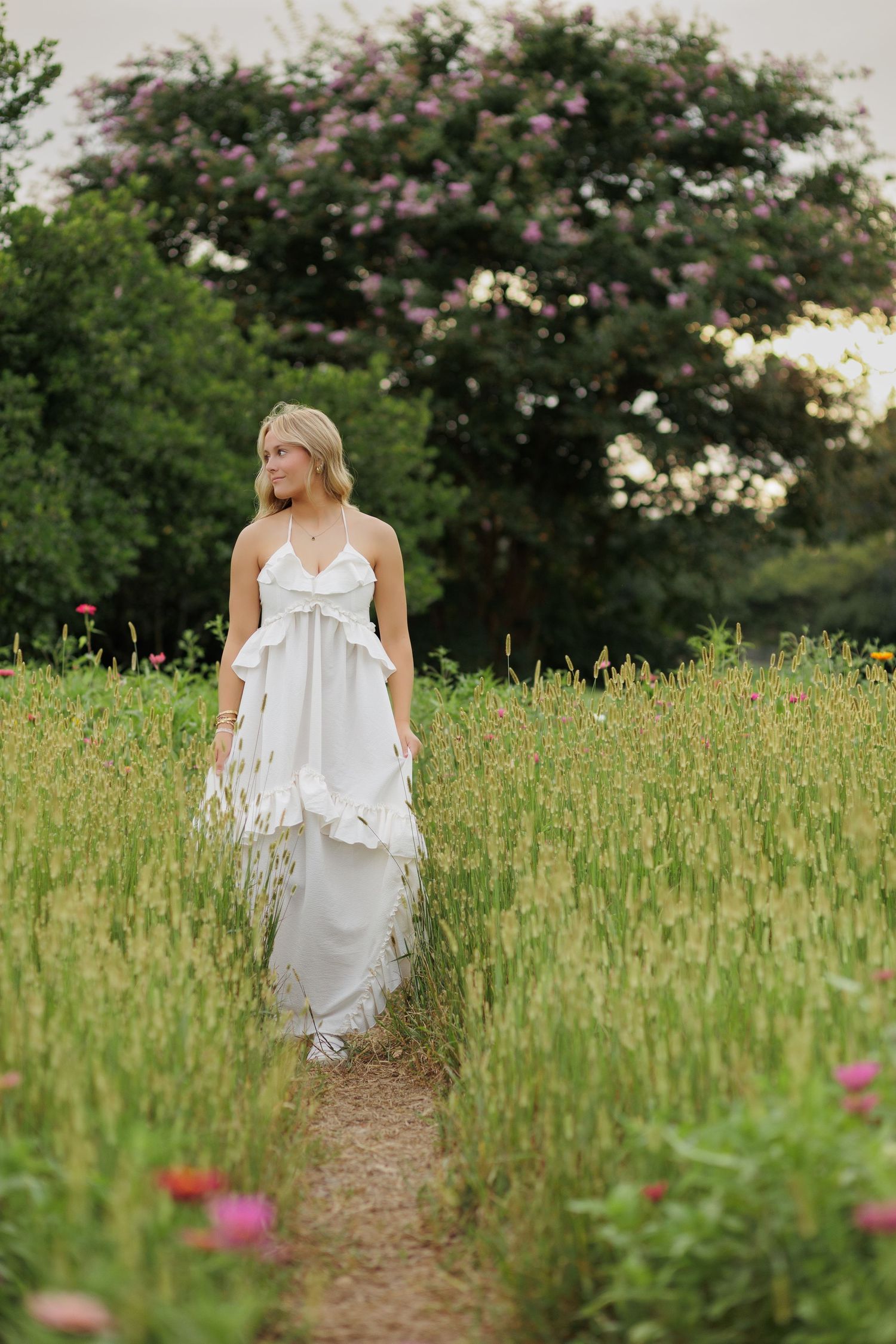 Wake Forest Senior Photography in a flower field at Dix Park in Raleigh, NC