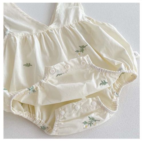 Vintage cream-colored baby bloomers with delicate floral embroidery details shown in multiple angles.