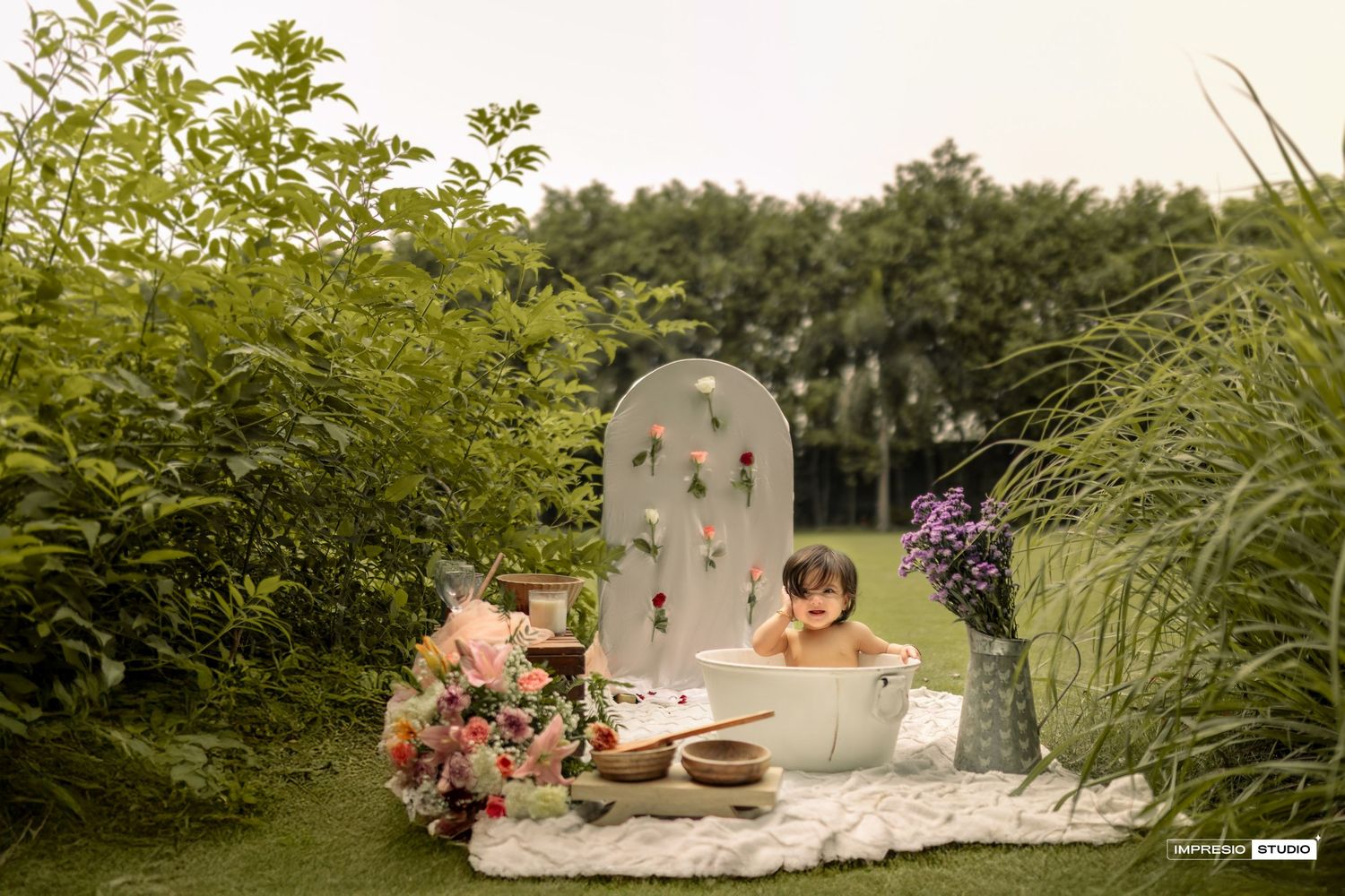 A collection of garden scenes showing lush greenery, pathways, and rustic outdoor elements arranged in a horizontal strip.