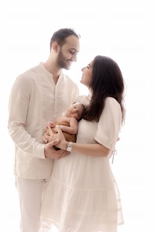 Indoor newborn photoshoot near me with family – Impresio Studio