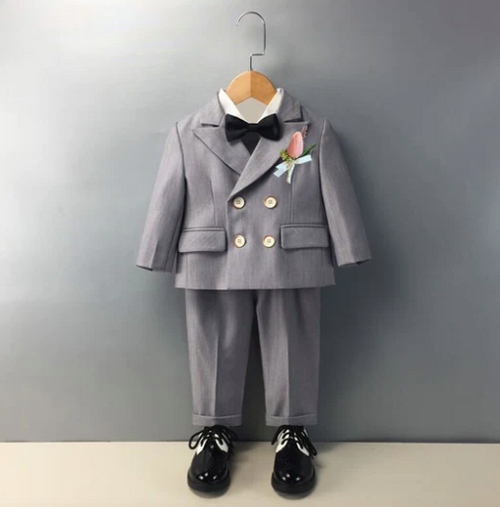 Grey formal double-breasted suit set for toddler with bow tie and dress shoes.