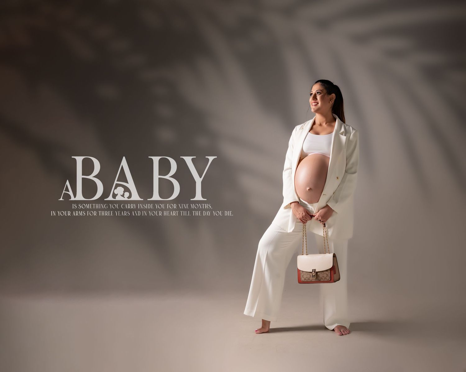 Professional maternity session with modern branding elements.