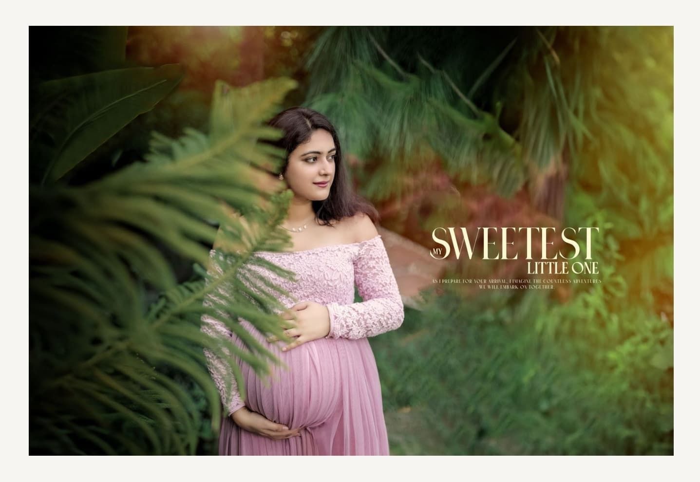Ethereal outdoor maternity photography session with pink dress among ferns and natural light.