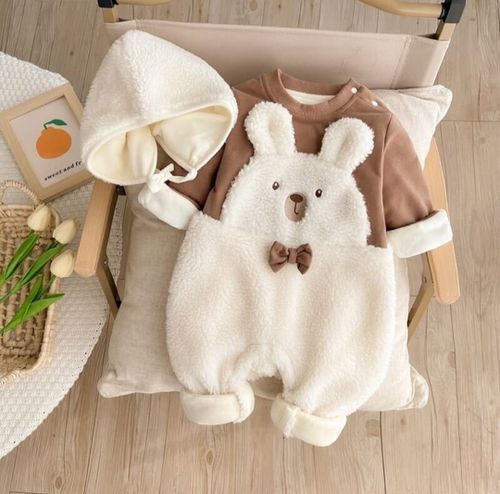 Plush white bunny-themed baby romper with brown bow tie and matching shirt.