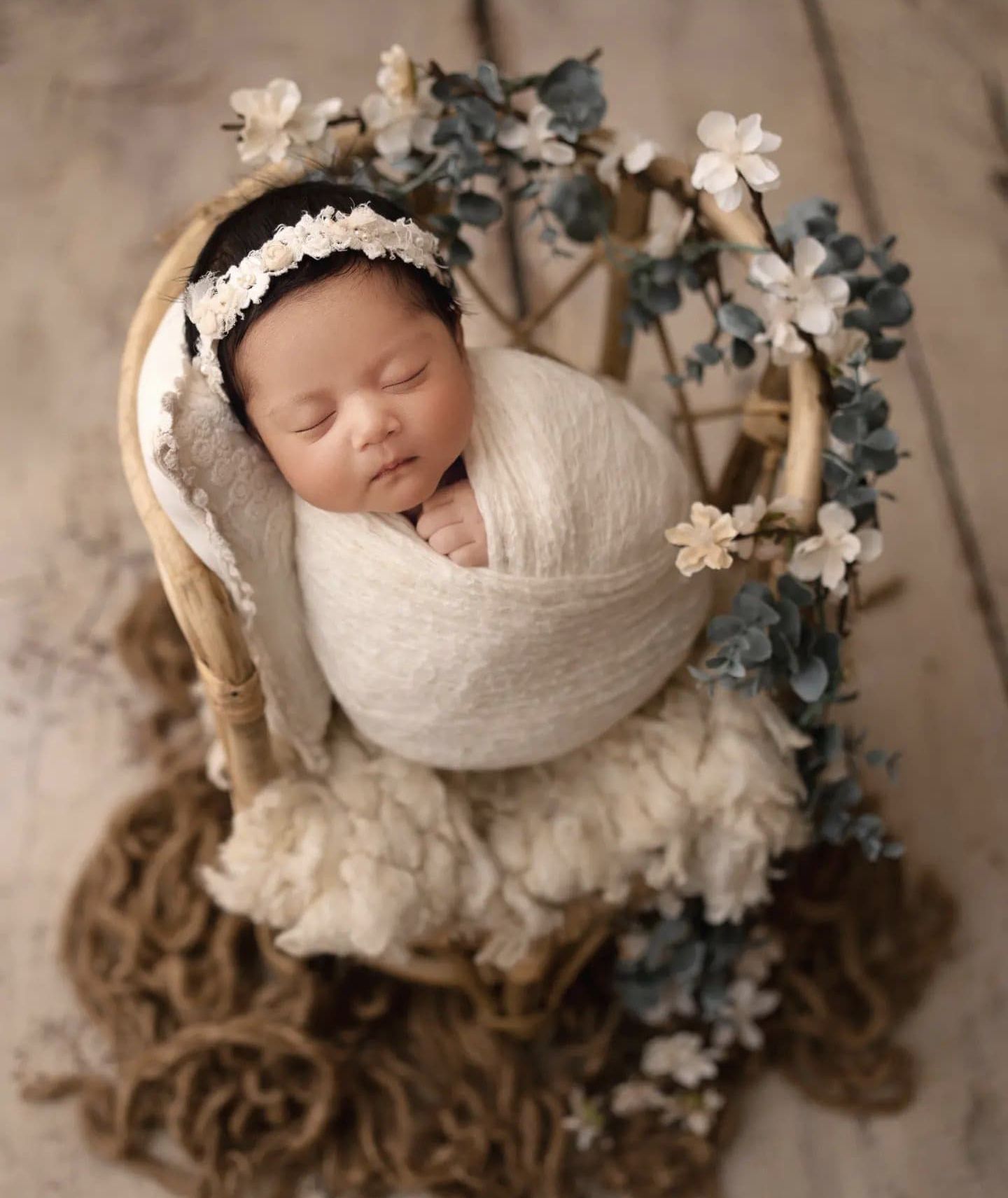 New born baby wrapped in lace for elegant photoshoot – Impresio Studio