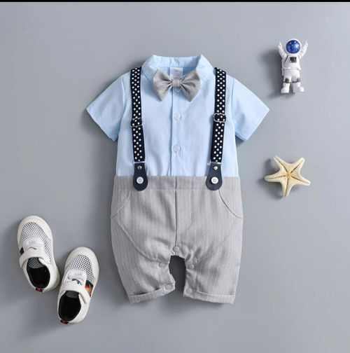 Baby boy outfit featuring blue shirt with suspenders, bow tie and gray shorts.