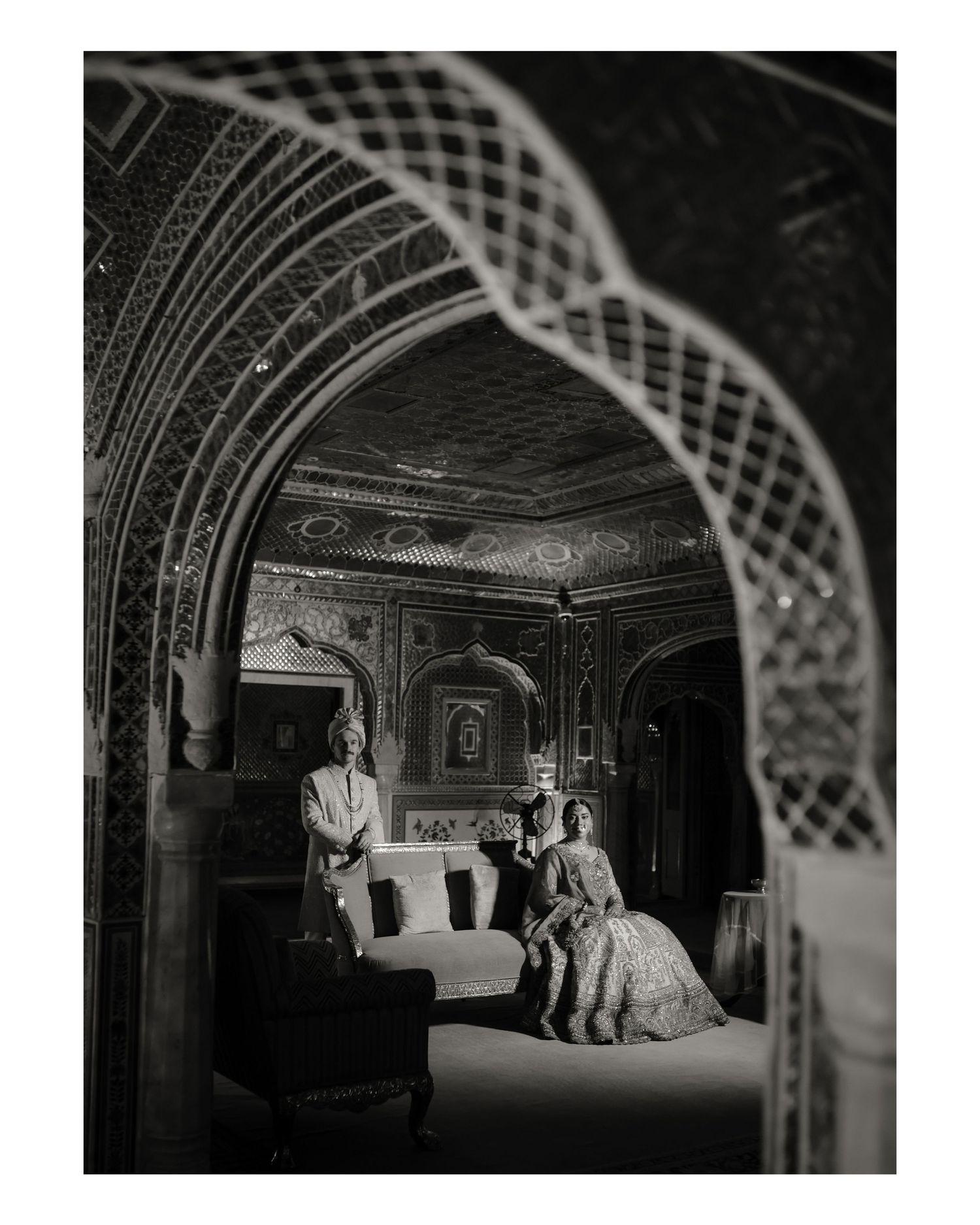 Black and white photographs showing a dramatic theatrical performance staged in a Victorian-era room setting.