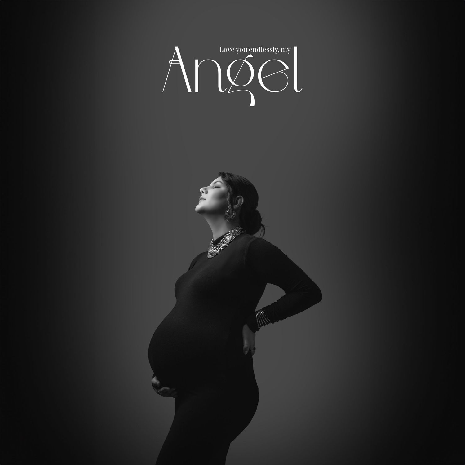 Artistic maternity silhouette with 'Angel' text overlay against dark background.