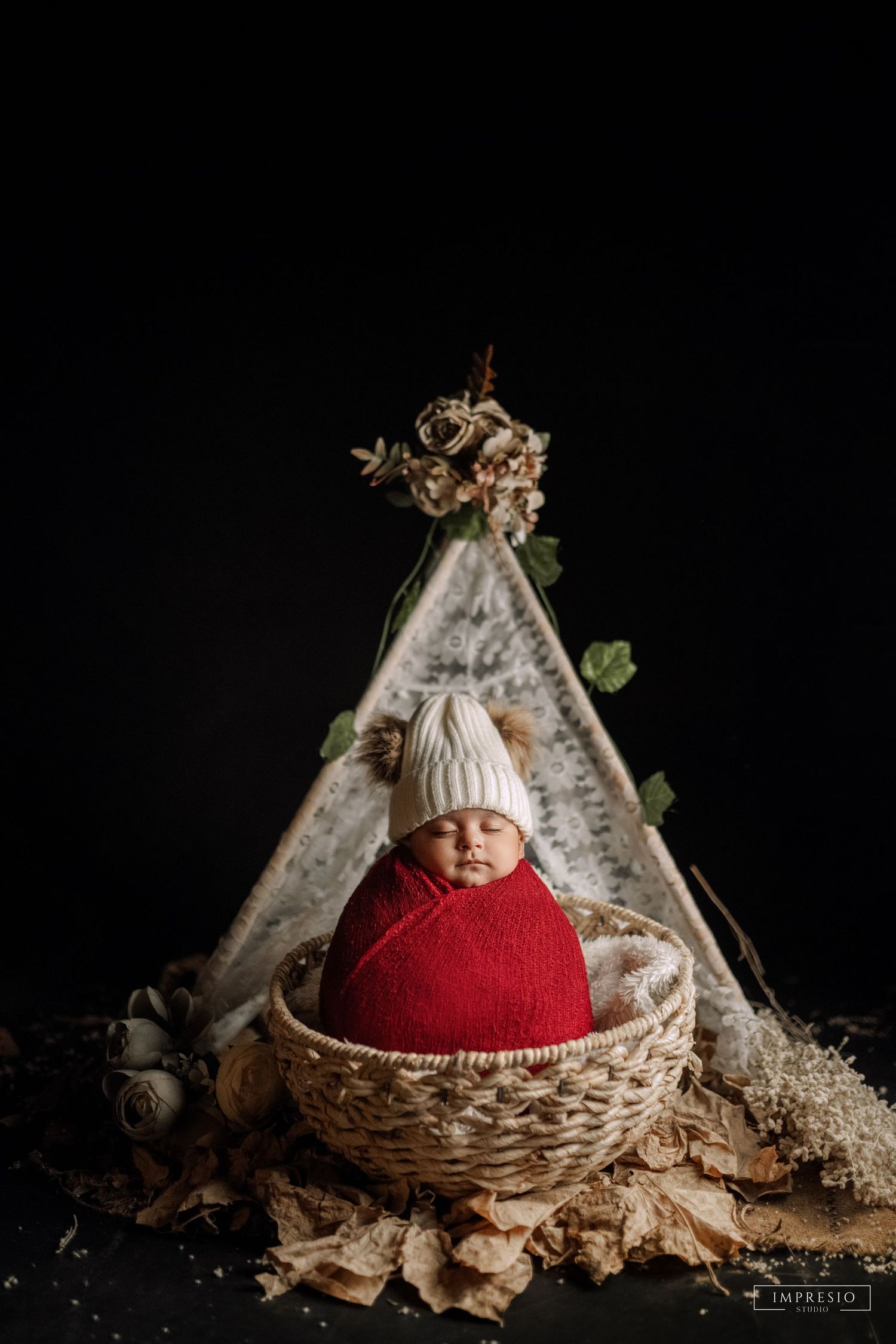 New born baby shoot near me – wrapped pose setup by Impresio Studio