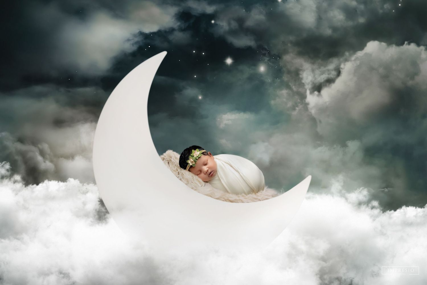 Baby sleeping on parent’s hands for emotional new born shoot – Impresio Studio