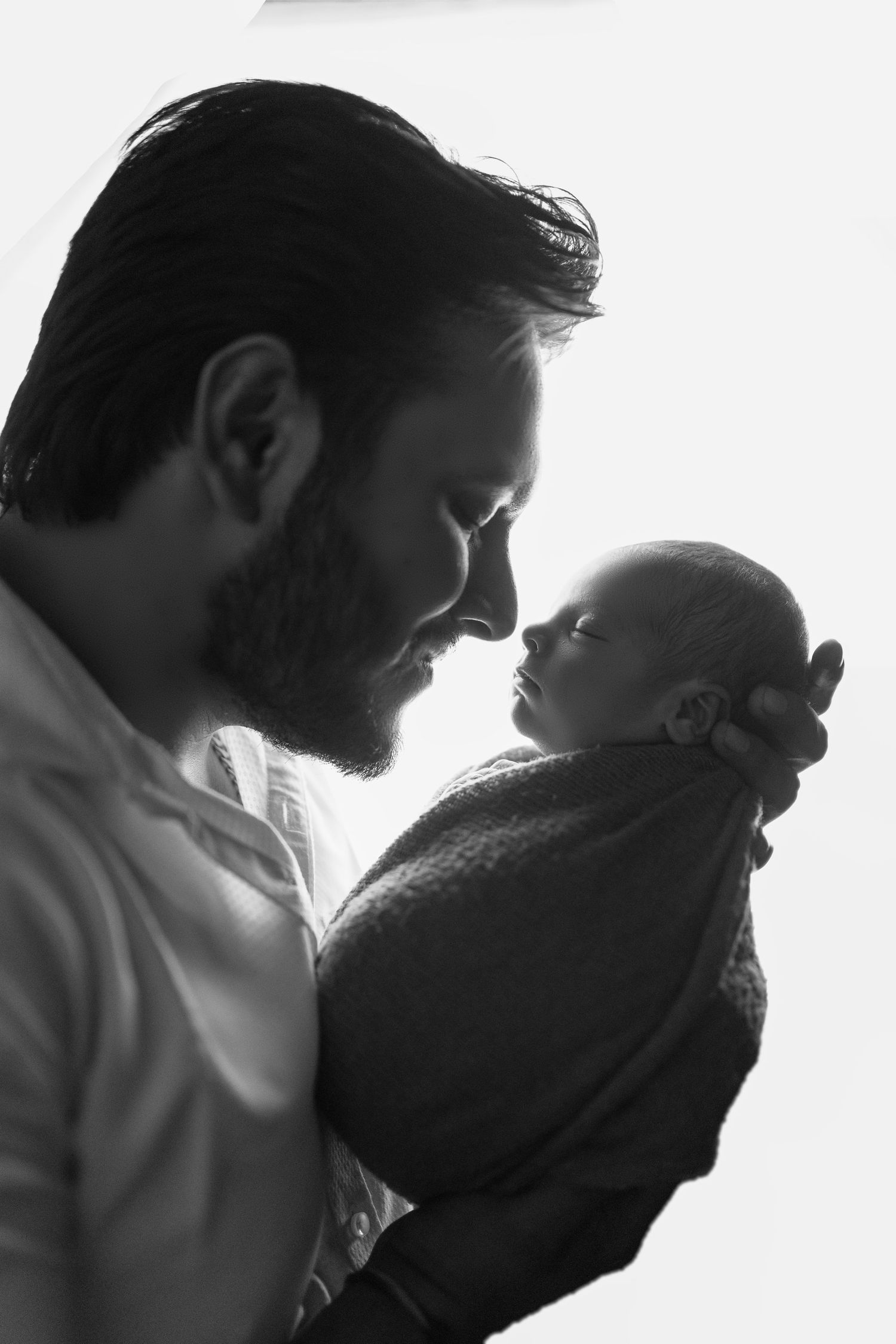 Baby lying on soft fur blanket during new born shoot – Impresio Studio