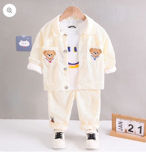 White corduroy set with teddy bear and bunny patches for toddlers.