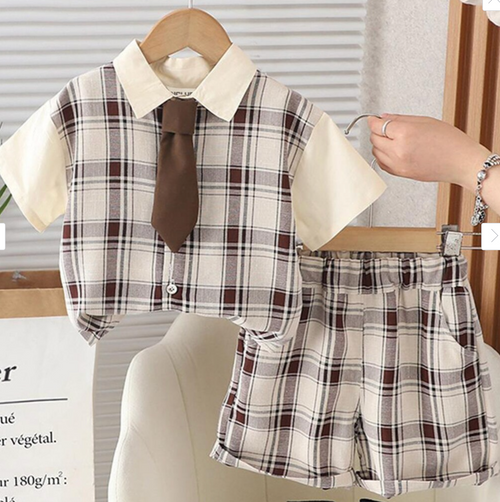 Boys formal wear set with plaid pattern and decorative tie.