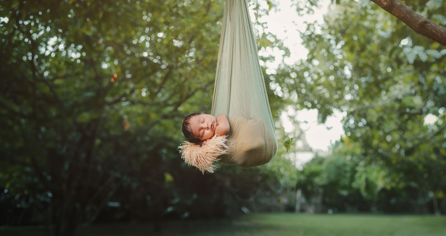 Baby sleeping peacefully during newborn photography session – Impresio Studio