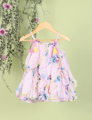 Watercolor floral print baby dress in pastel pink and blue tones.