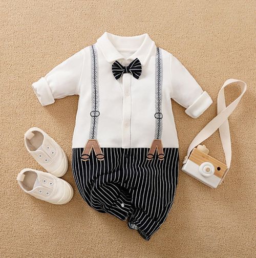 Formal baby outfit with white shirt, bow tie, suspenders and striped pants with matching shoes.