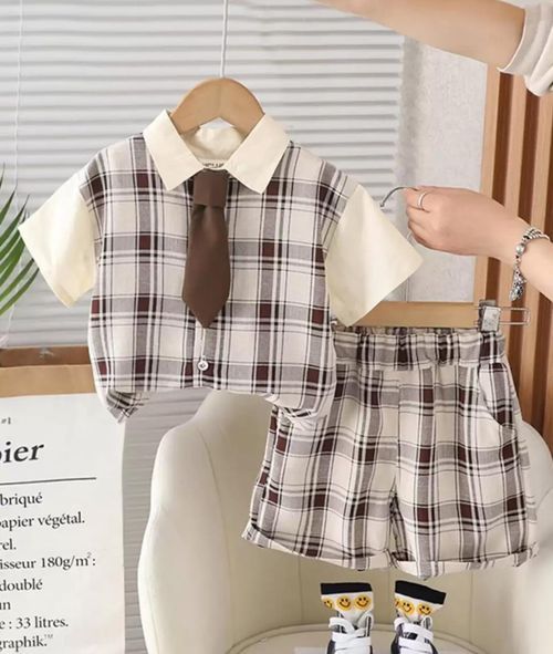 Black and white plaid baby dress with contrasting white collar shown from multiple angles.