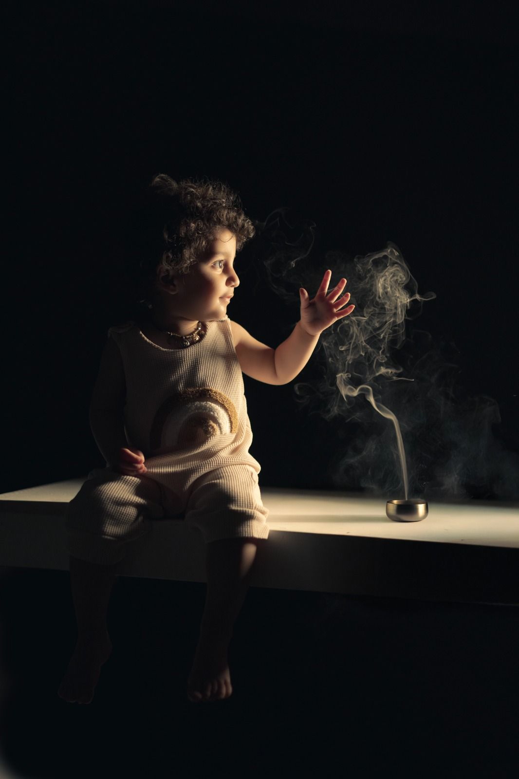 Indoor pre birthday photoshoot near me with pastel tones – Impresio Studio