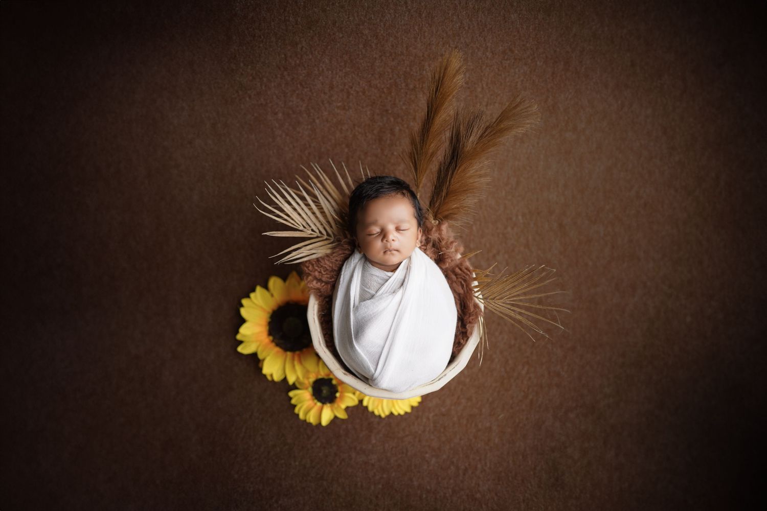 Themed new born baby photoshoot – floral basket concept by Impresio Studio