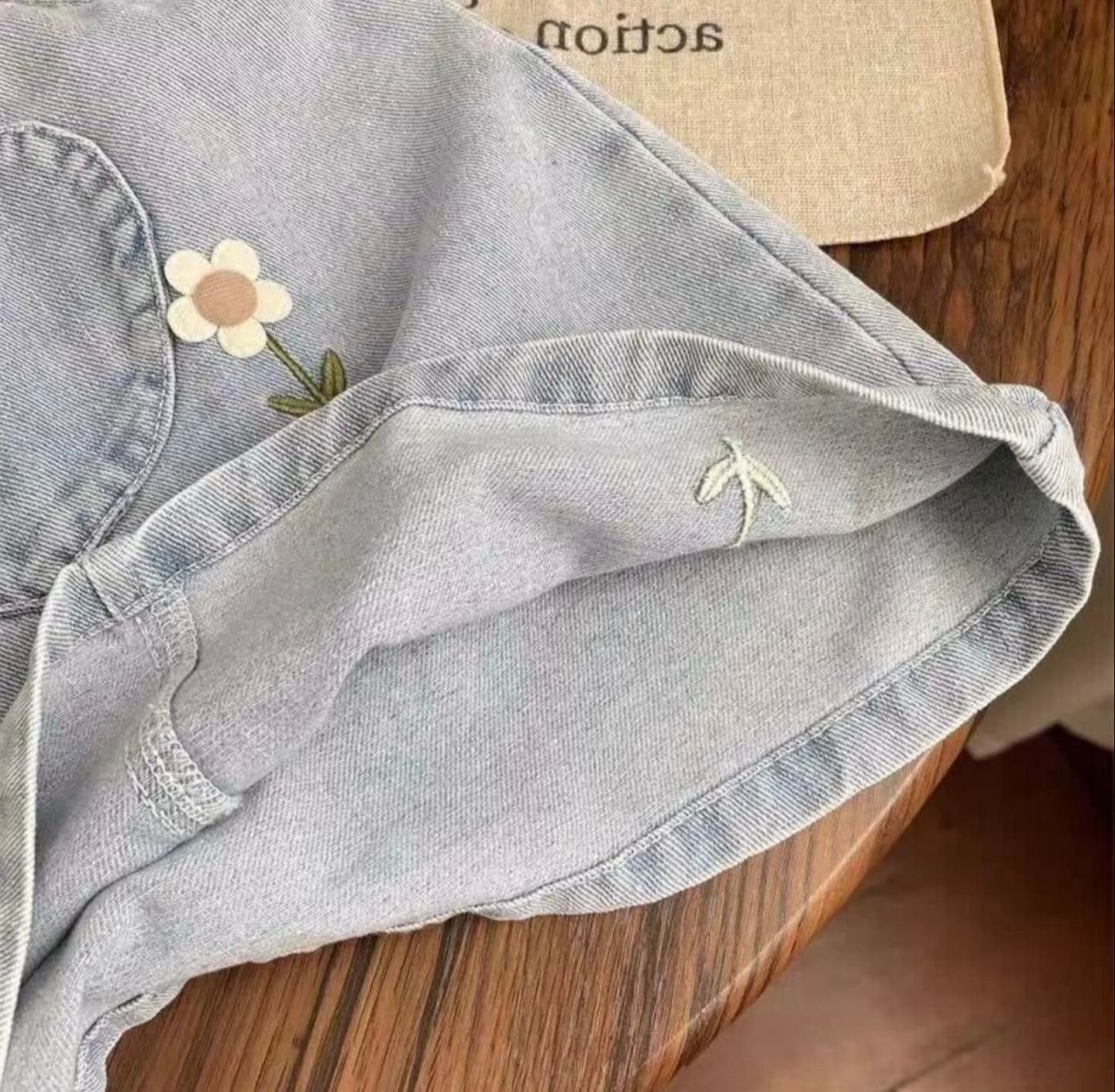 Faded light blue denim sun hat with scalloped brim edge shown from multiple angles.