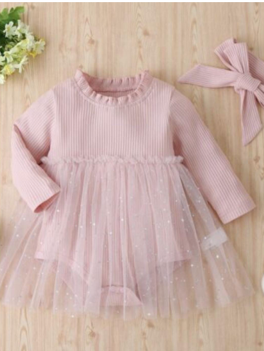 Pink tulle baby dress with long sleeves and ruffled neckline.