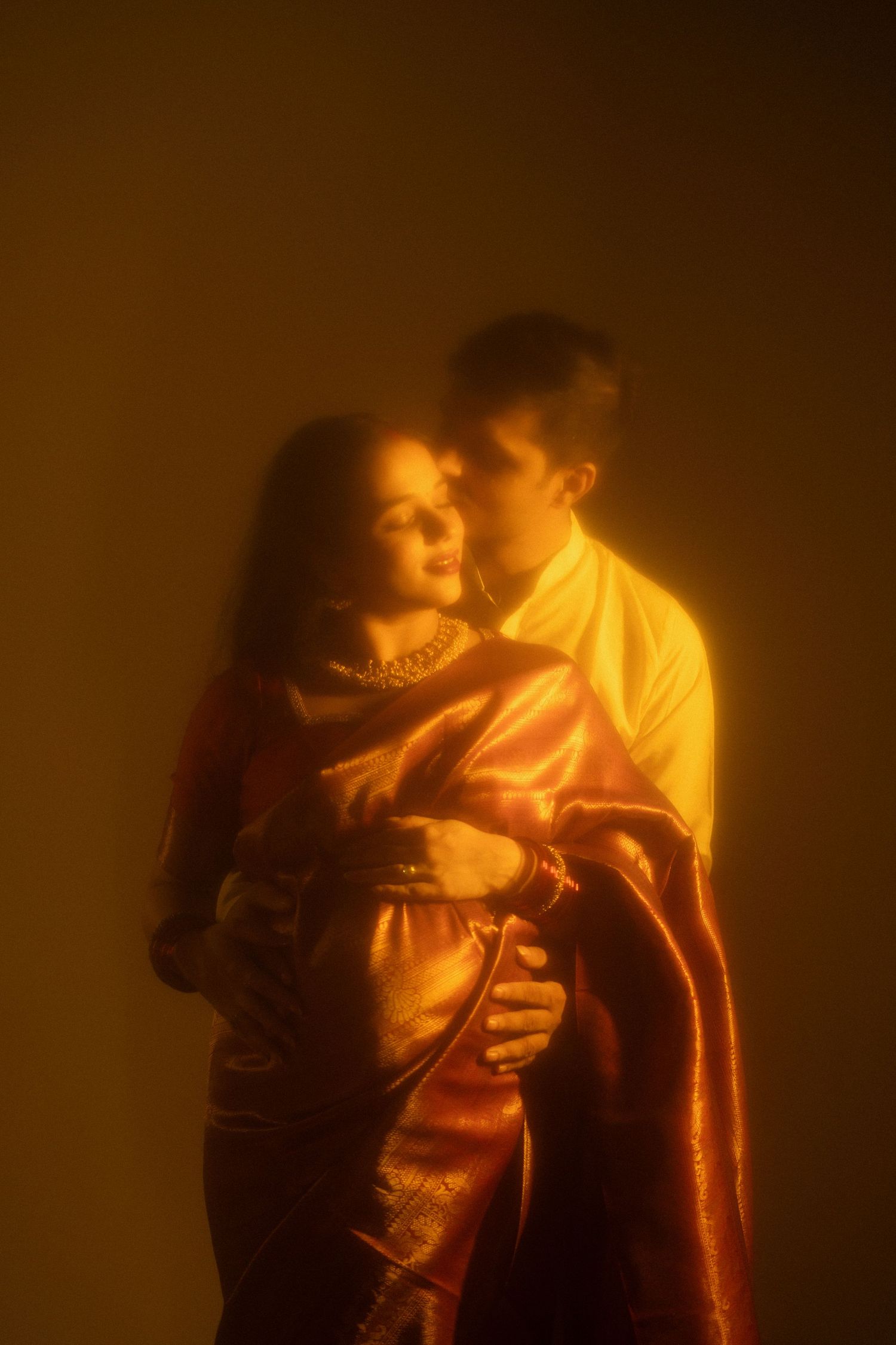 Professional maternity shoot in Gurgaon with floral backdrop – Impresio Studio