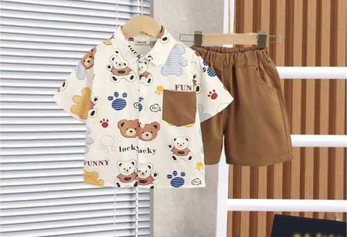 Green and white striped sweatshirt with beige pants featuring teddy bear knee patches.