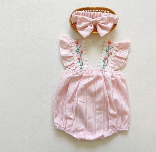 Pink striped baby romper with bow details and floral embroidery shown in multiple views.