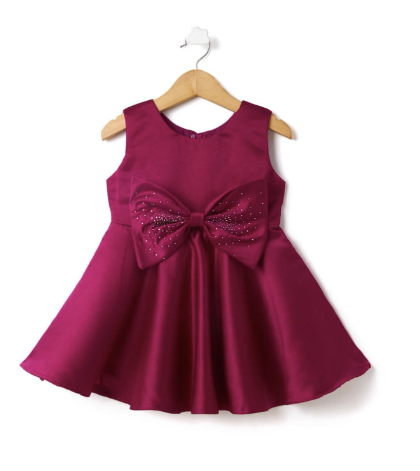 Burgundy party dress with sparkly bow detail and flared skirt design.