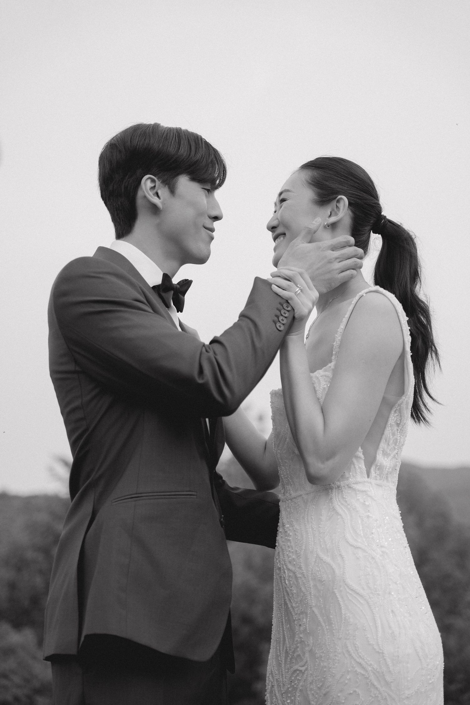Black and white wedding photography sequence showing emotional moments.