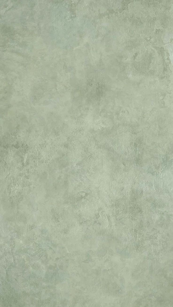 Seamless sage green textured background with a subtle mottled pattern and distressed vintage appearance.