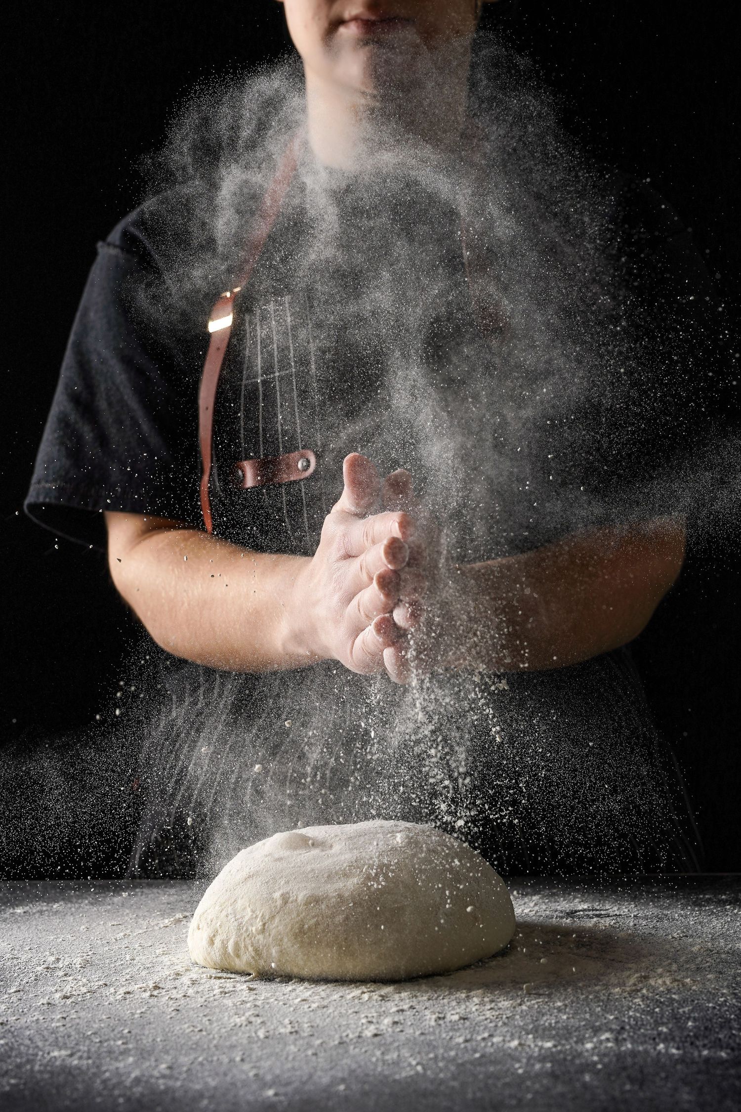 Baker making a Flour clap, Northeast Ohio professional photographer | Scalera Design Studio