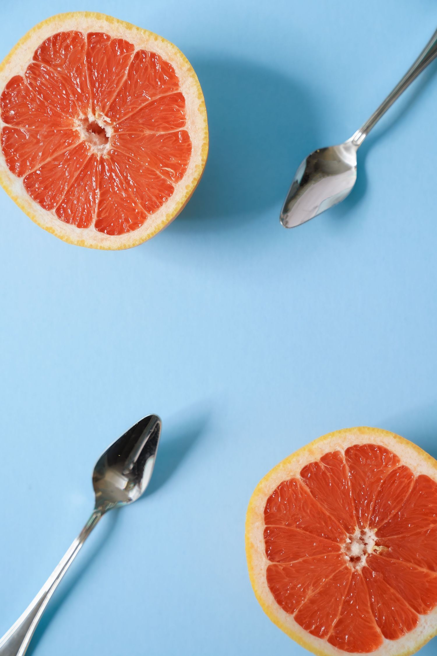 grapefruits on blue background