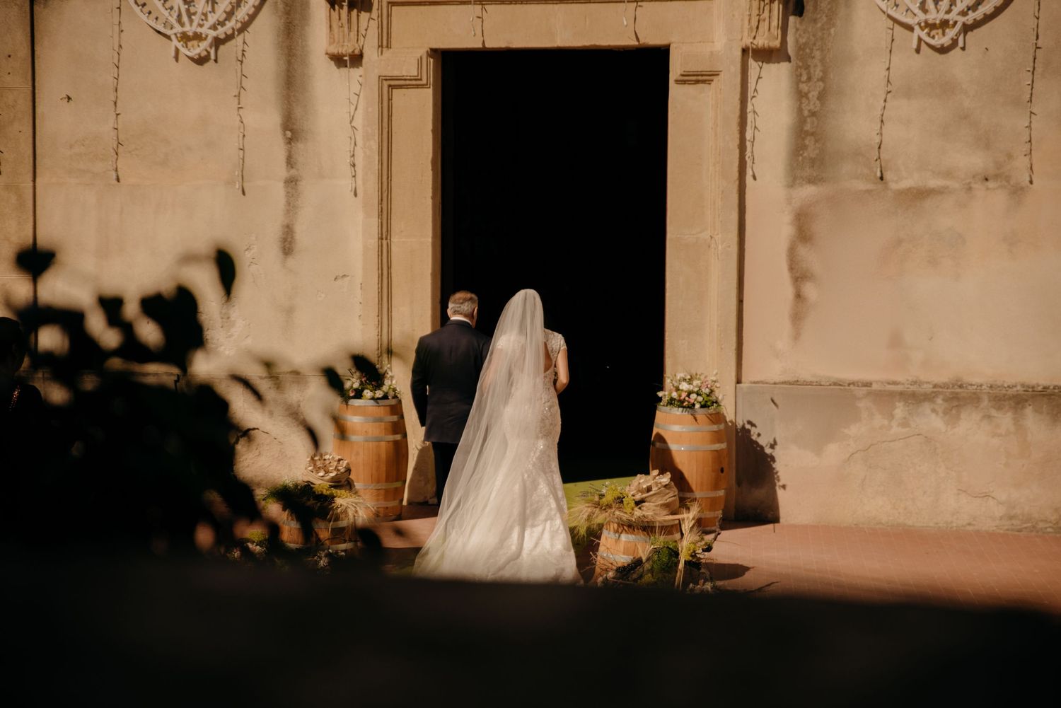 A sepia-toned collage of wedding ceremony moments with vintage decor and romantic lighting.