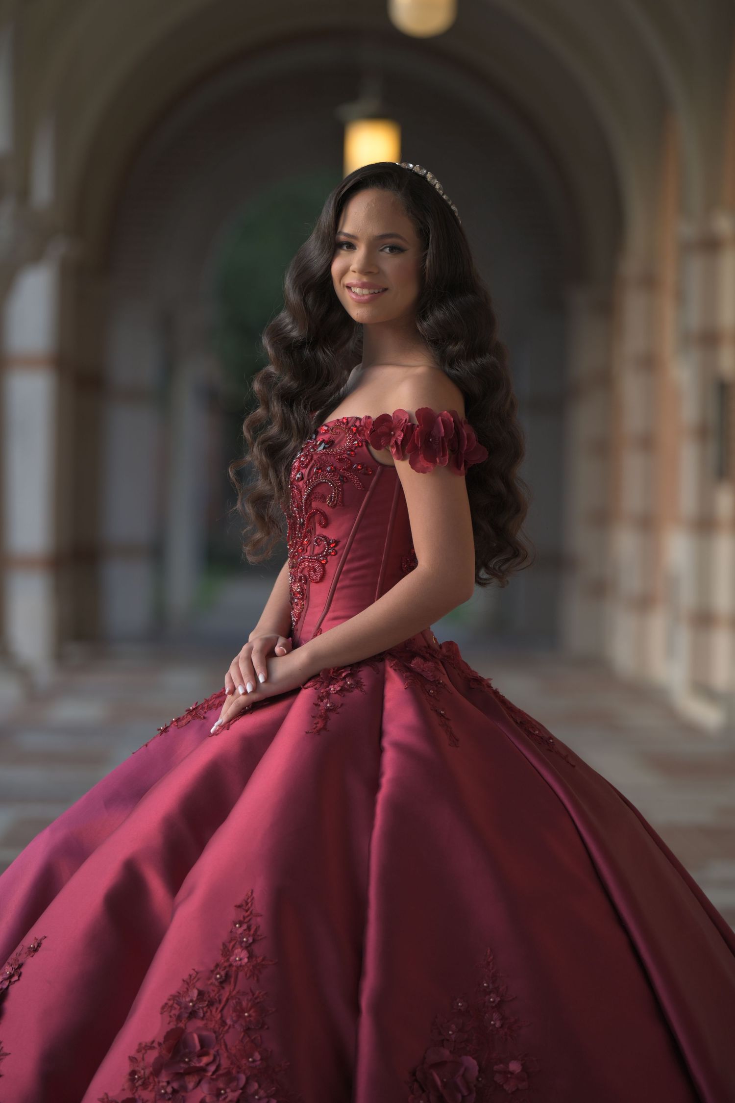 Quinceañera portrait at Rice University in Houston, featuring elegant dress and architectural background.