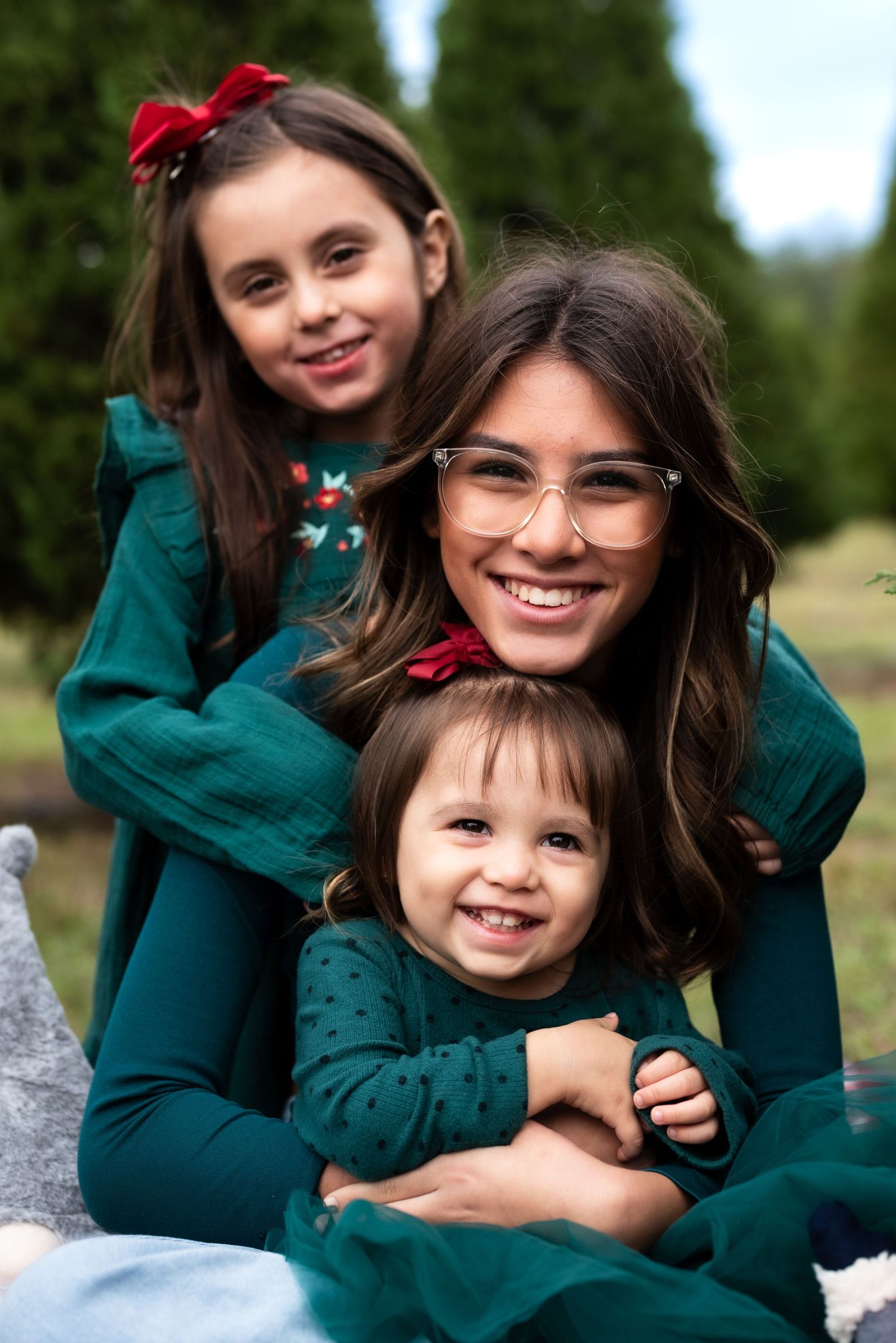 Christmas family portrait taken in Houston, Texas, featuring coordinated holiday outfits and festive decor. Perfect for seasonal memories, h