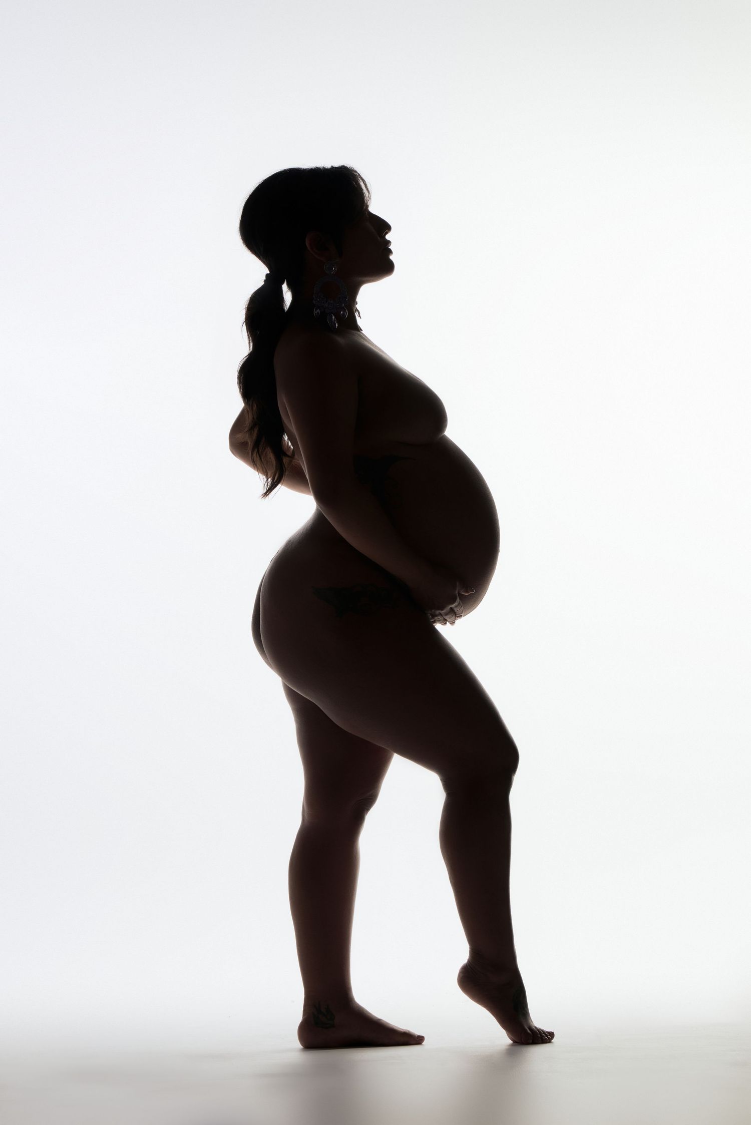 Studio maternity portraits highlighting beauty, strength, and the miracle of motherhood.