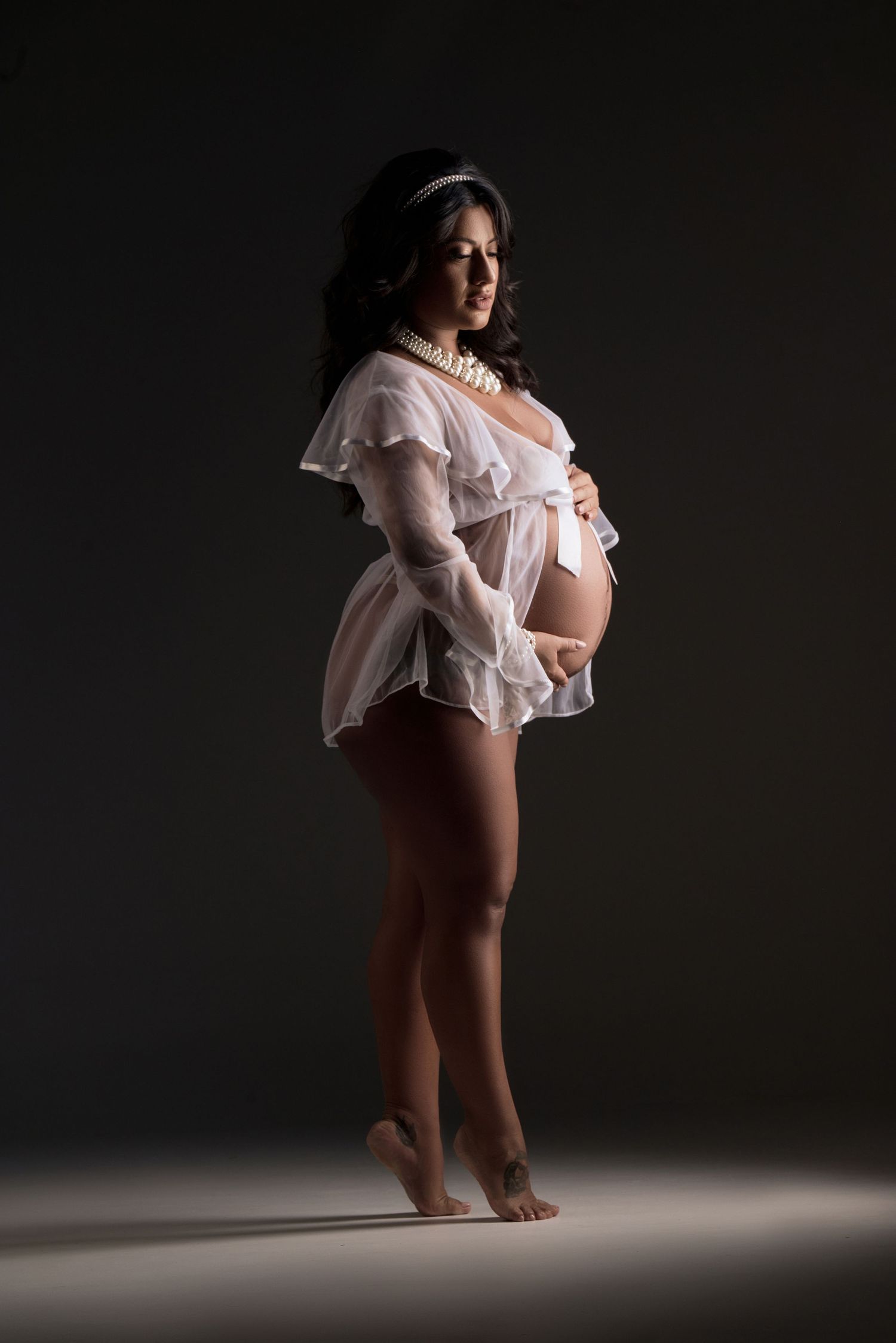 Studio maternity portraits highlighting beauty, strength, and the miracle of motherhood.