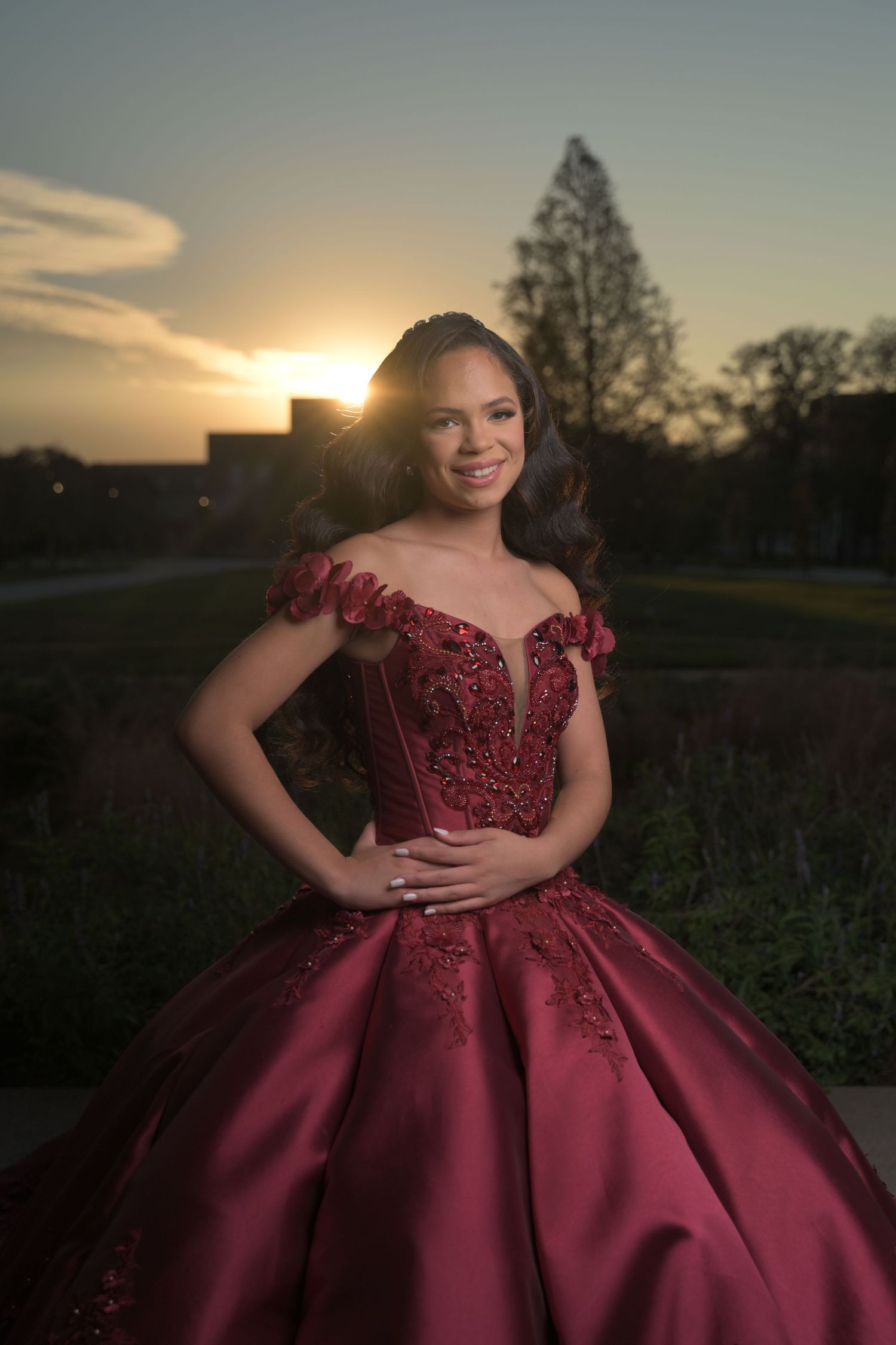 Quinceañera portrait at Rice University in Houston, featuring elegant dress and architectural background.