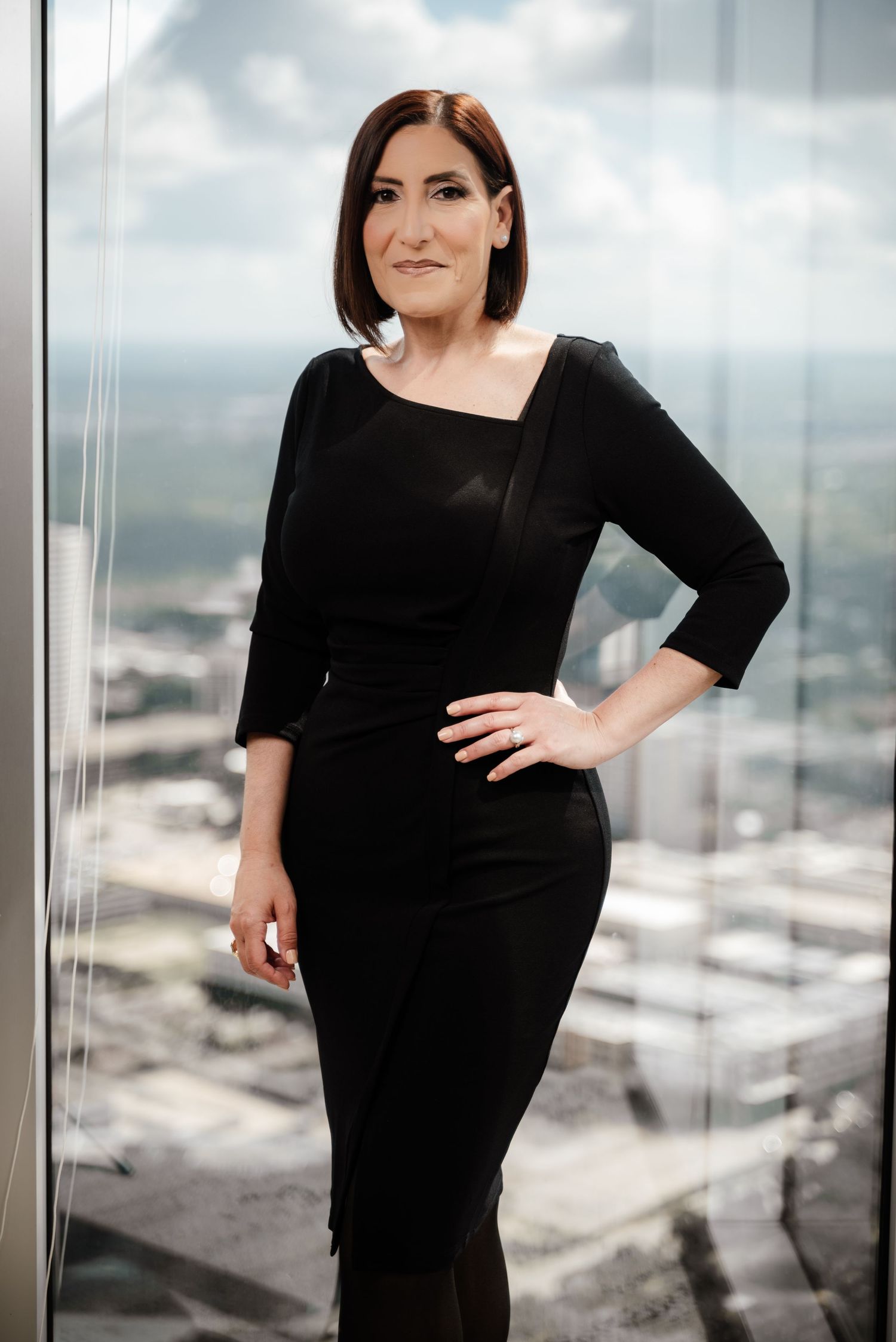 Empowered woman portrait with confident expression, captured in Houston for personal branding