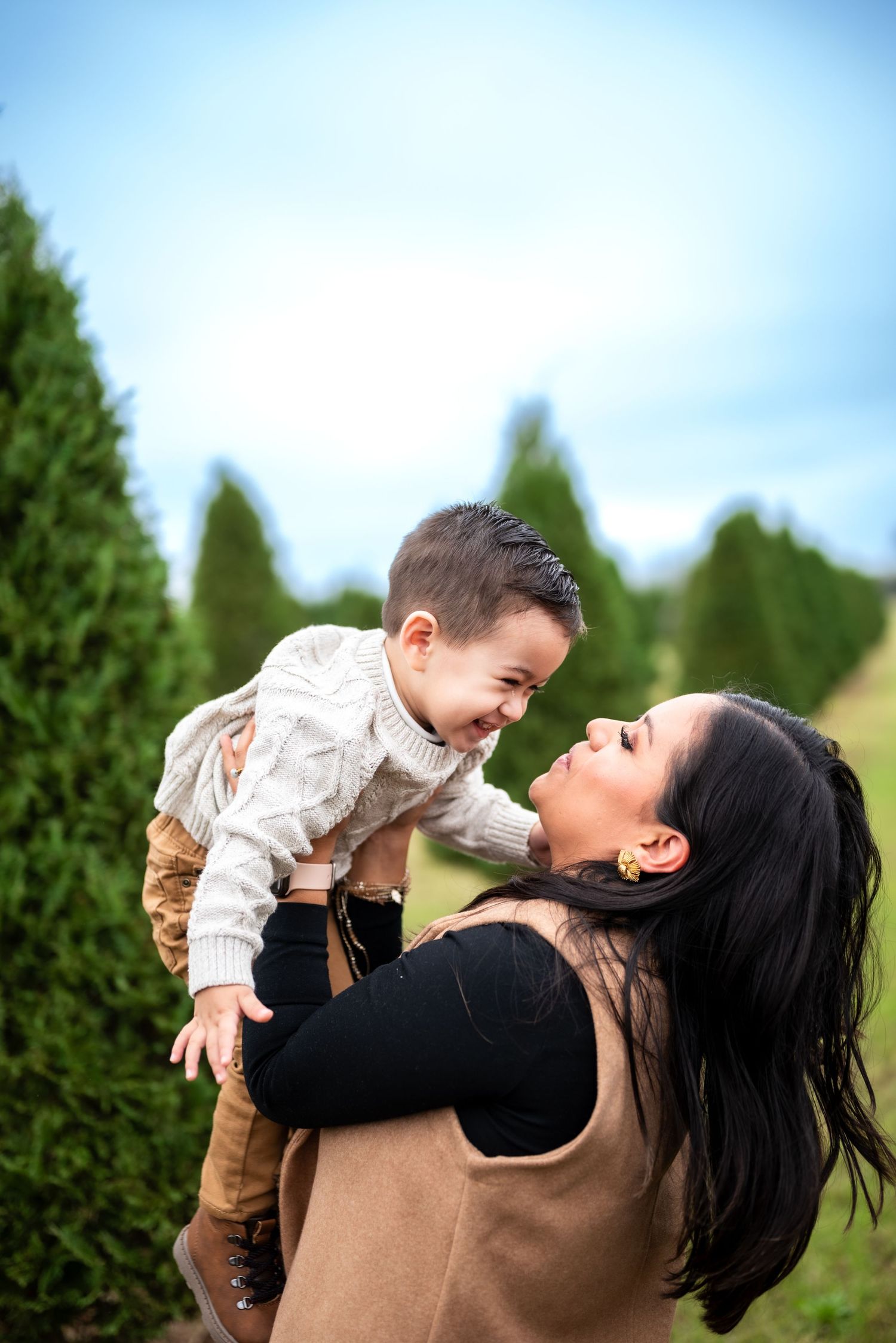 Outdoor Christmas photo session—festive, cozy vibes with lights, smiles, and holiday magic.