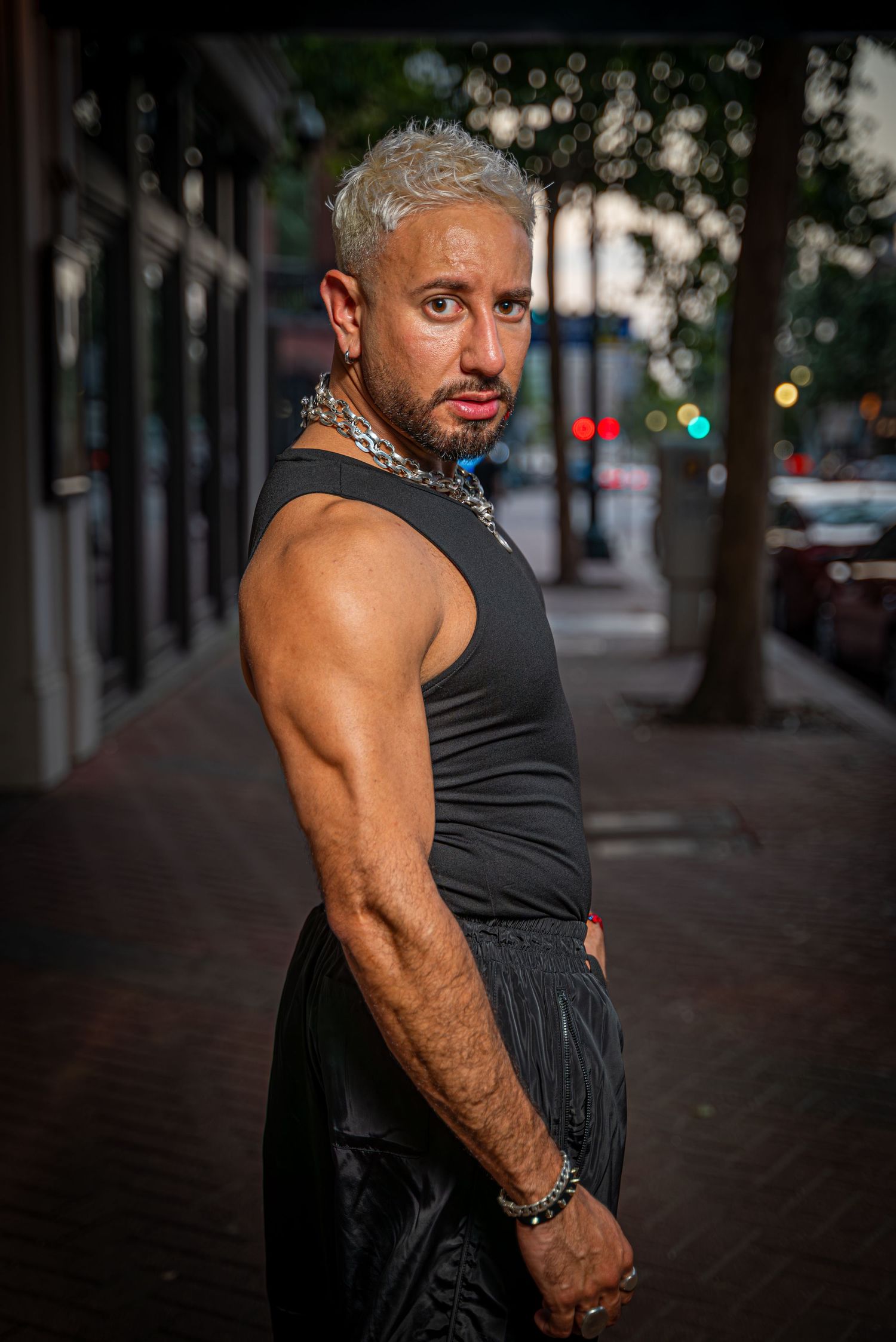 Professional portrait of a beauty specialist taken in downtown Houston, Texas. Urban background with natural lighting, ideal for personal br