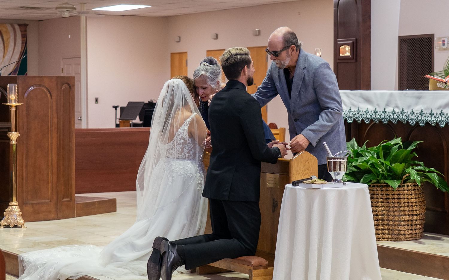 A series of wedding ceremony photos showing a bride in a white dress and veil at different moments in a church setting.