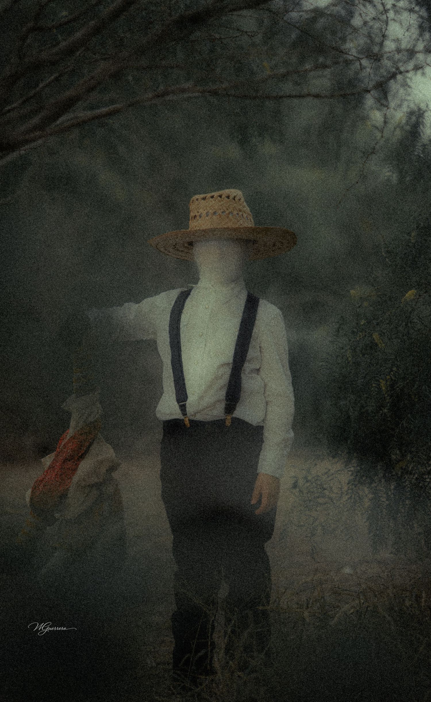 Faceless figure in straw hat and suspenders standing on misty path with another figure in background.