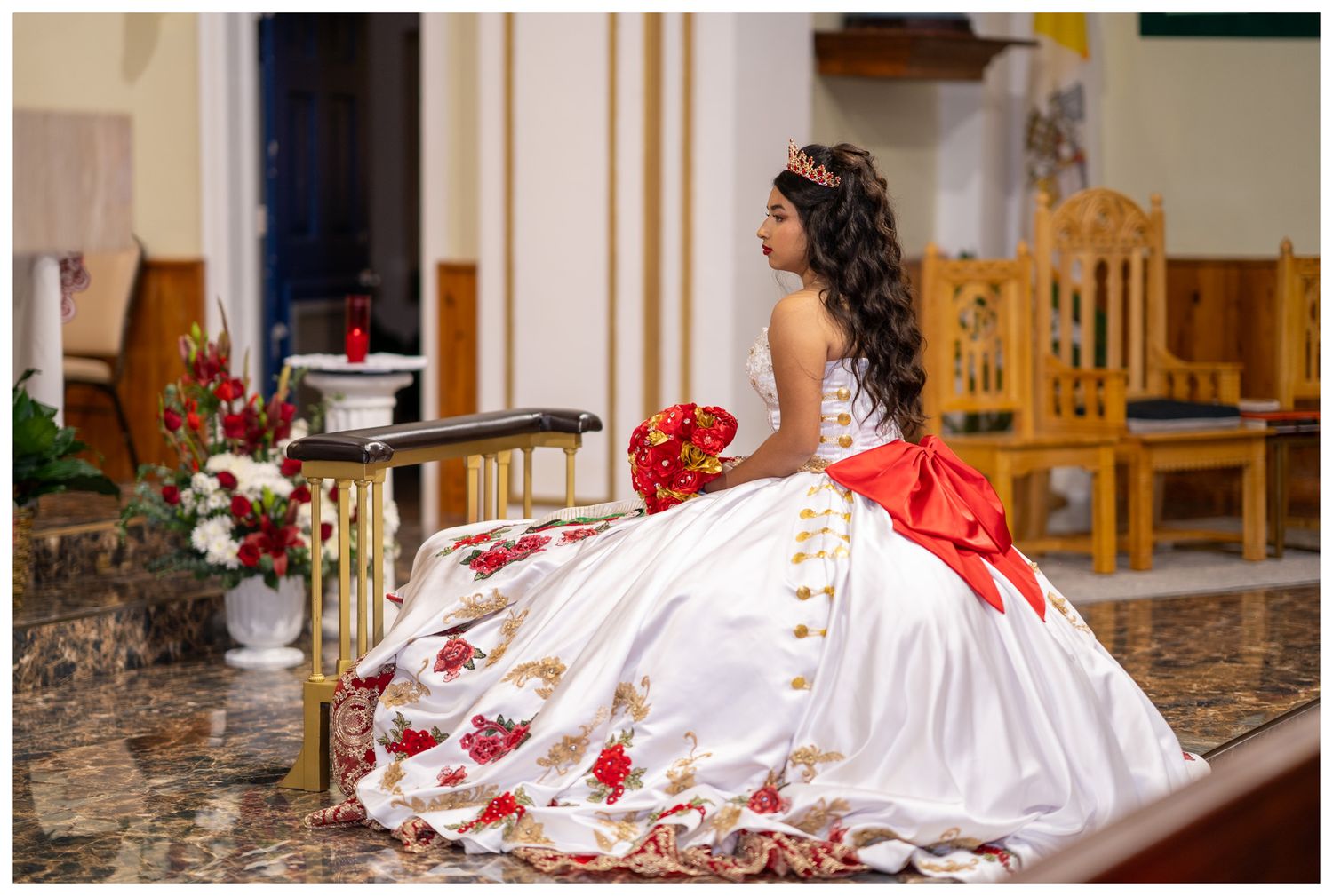 A white and red quinceañera dress with floral details is displayed across multiple photos in an elegant indoor setting.