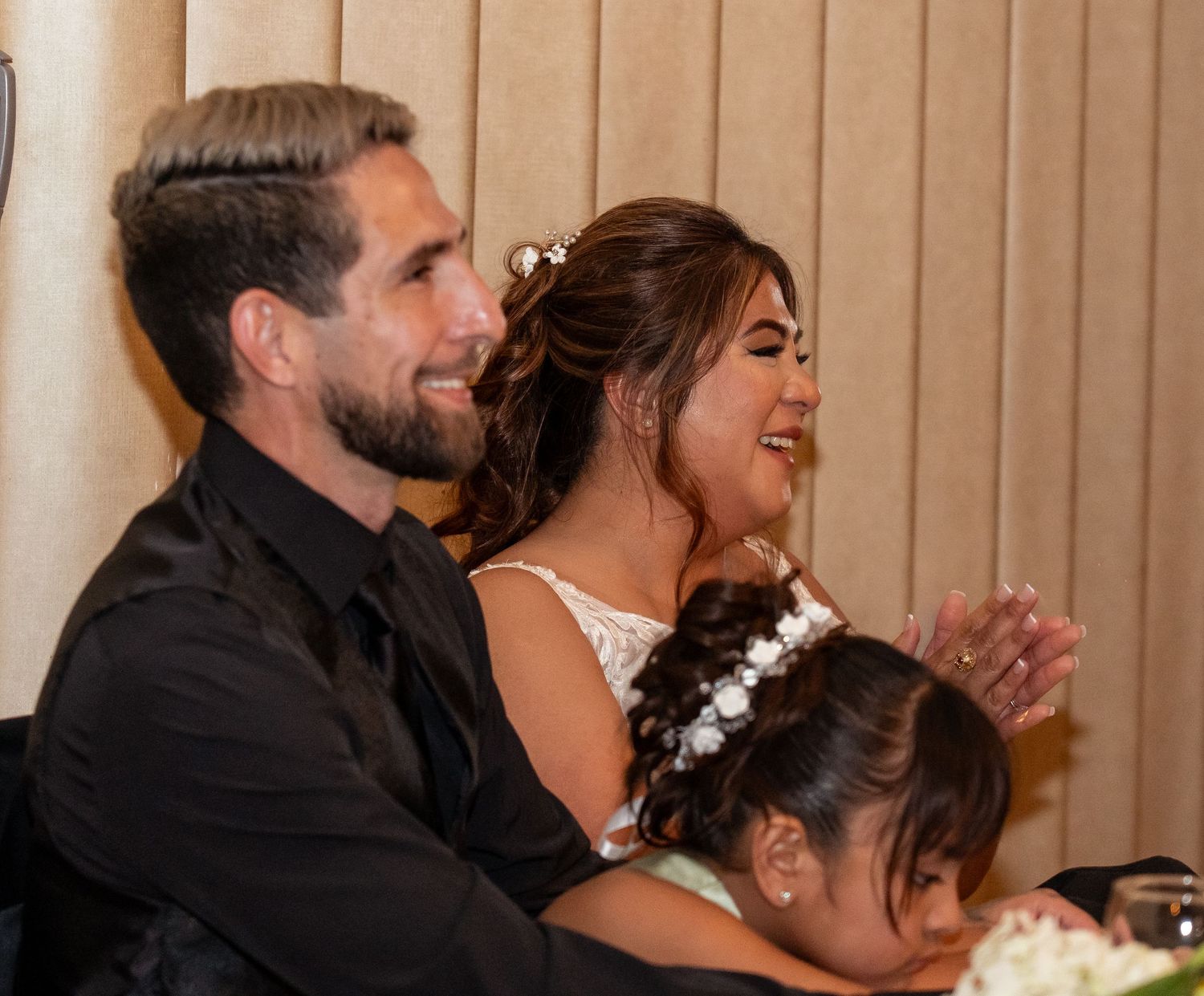 Joyful moments captured during a wedding reception celebration.