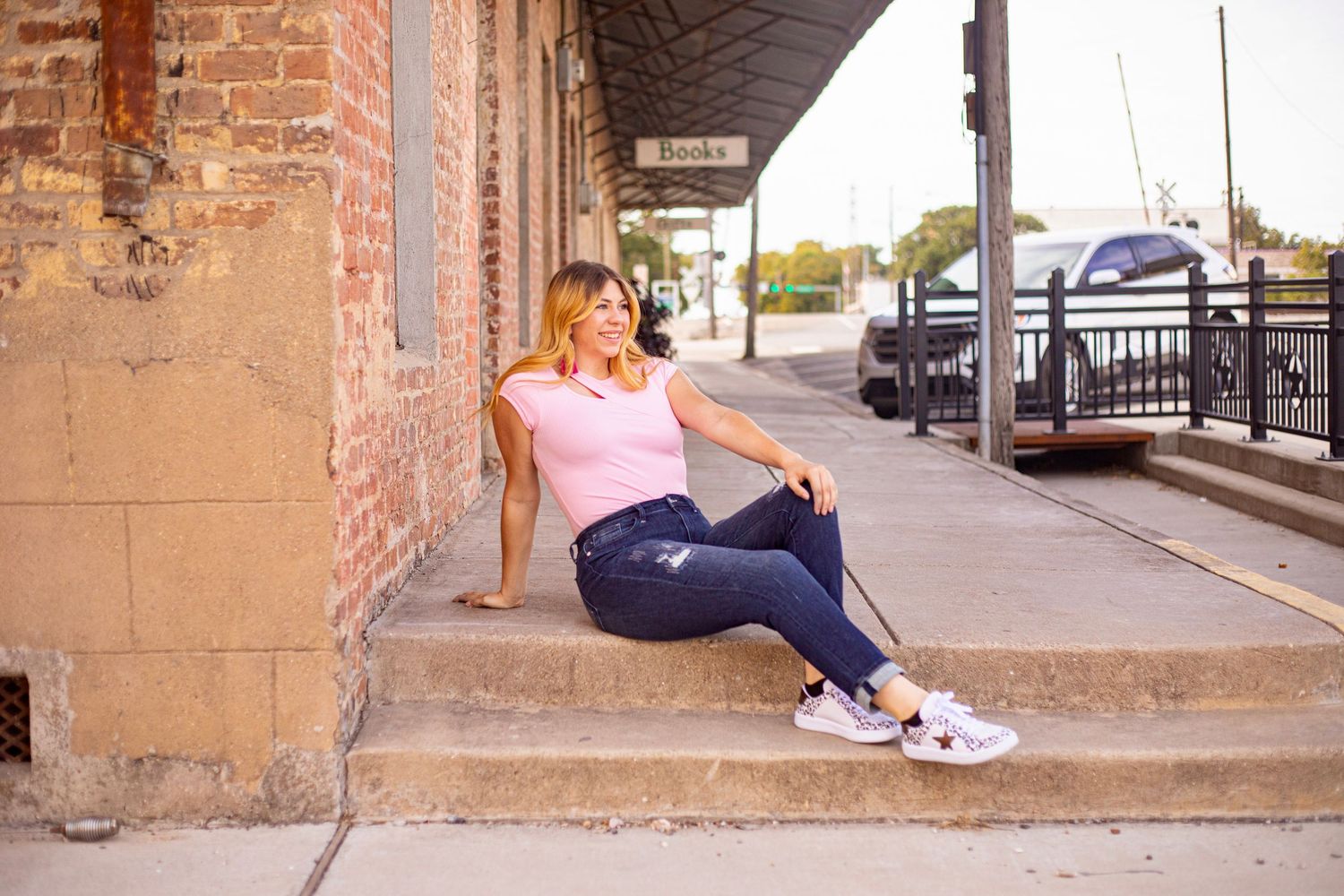 Urban photo series with brick architecture and sidewalk elements.