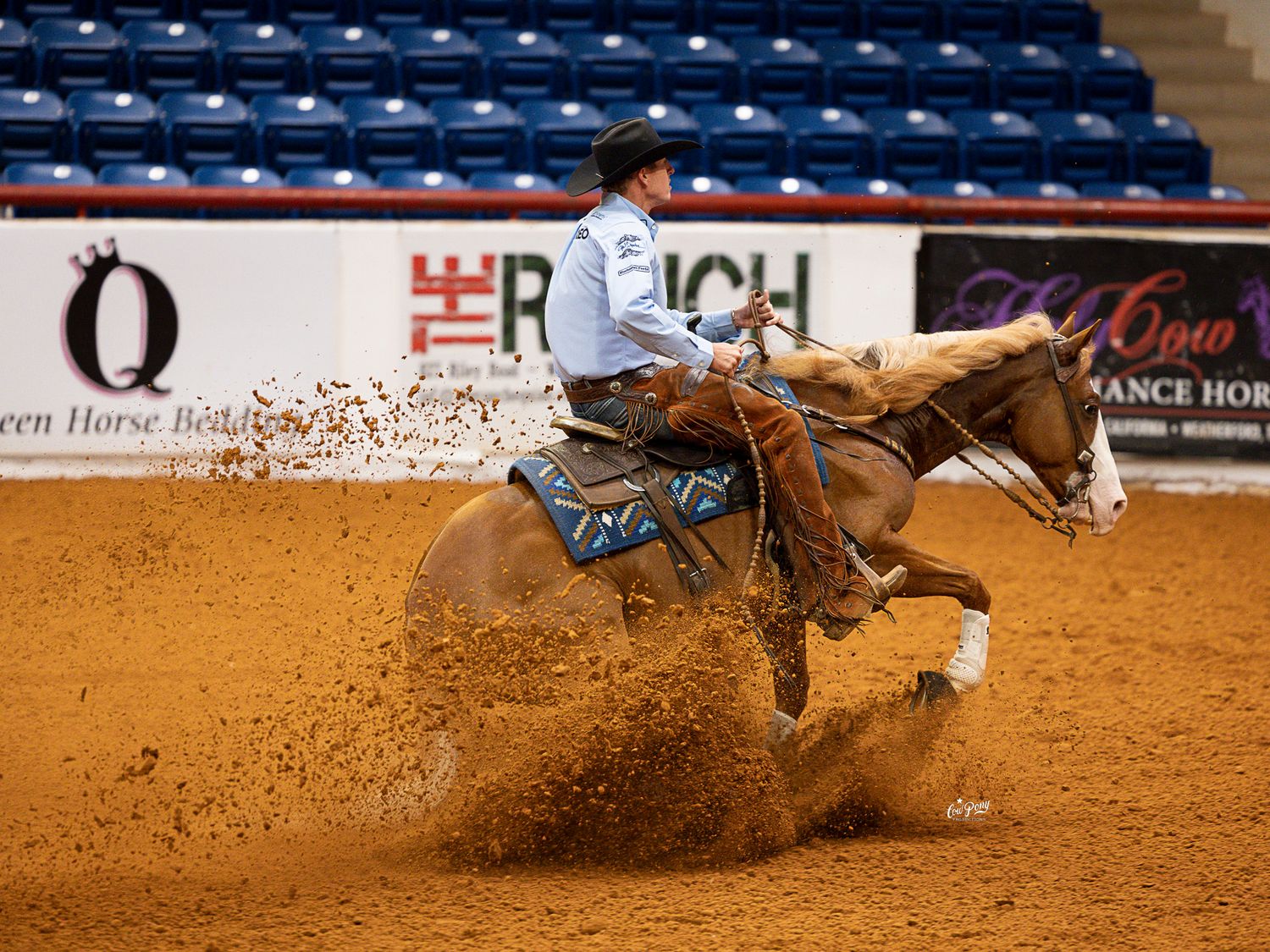 Lee Deacon and CR Dainty N Tuff making a huge sliding stop in the open bridle class at the Wild Rag